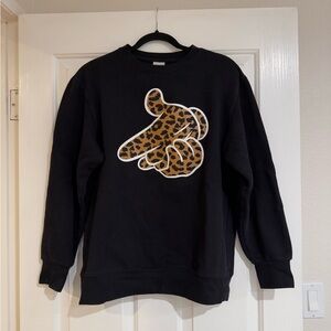 Black Sweater with Leopard Print Design
